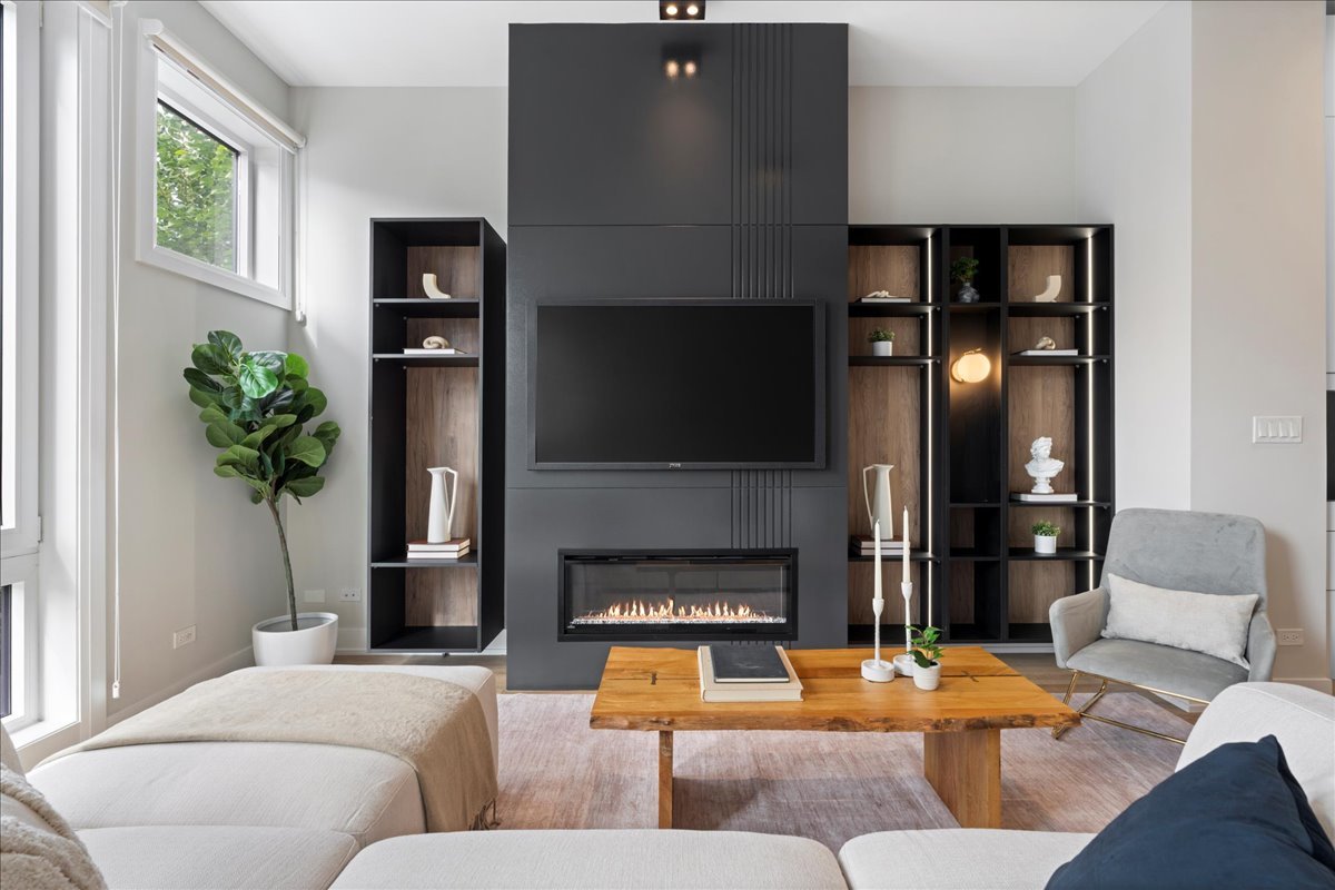 4232 West Belmont Avenue, Unit 2 Chicago, IL 60641 - Photo 6 of 35 a living room with furniture and a fireplace