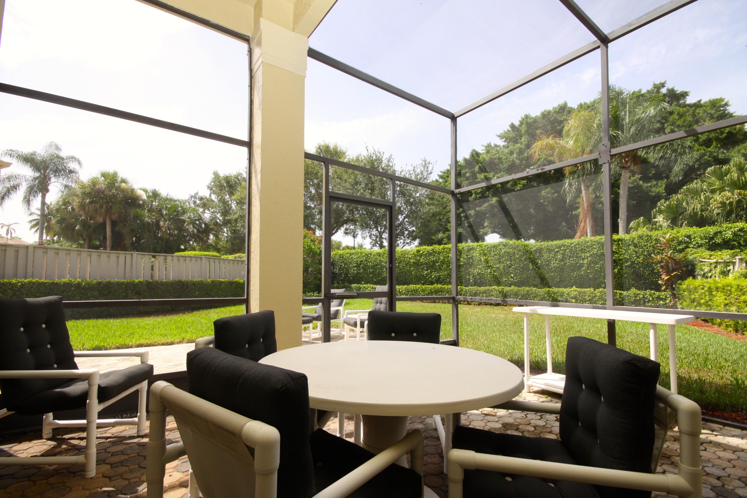 2408 Northwest 63rd Street Boca Raton, FL 33496 - Photo 14 of 34 COVERED/ SCREENED PATIO