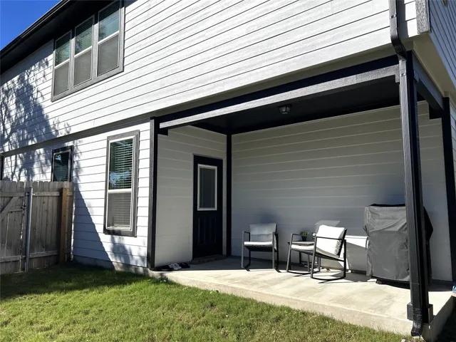 a view of outdoor space with deck and tree
