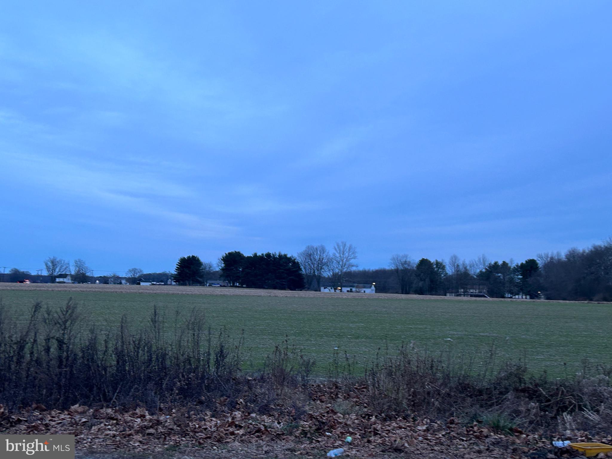214 Buddtown Road Southampton, NJ 08088 - Photo 3 of 5 a view of a lake and green valley