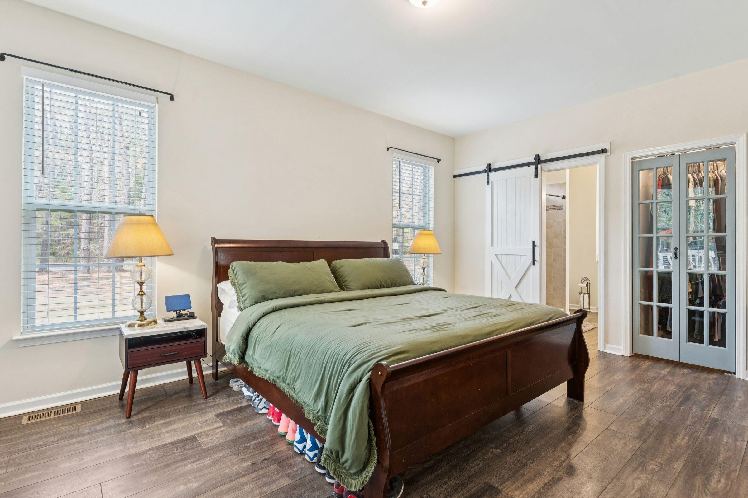 6350 Pepper Grass Trail Ravenel, SC 29470 - Photo 25 of 65 First Floor Primary Suite