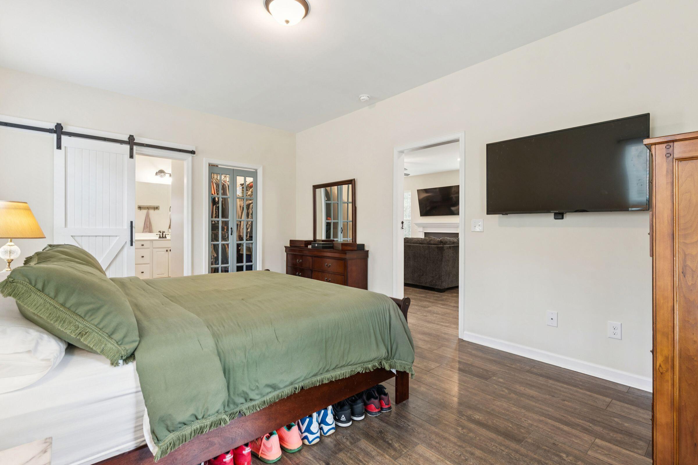 6350 Pepper Grass Trail Ravenel, SC 29470 - Photo 26 of 65 First Floor Primary Suite