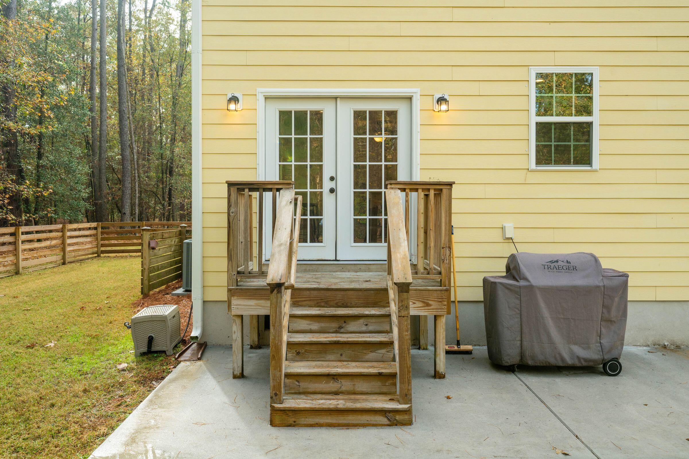 6350 Pepper Grass Trail Ravenel, SC 29470 - Photo 50 of 65 Rear Porch to Dining Area and Kitchen