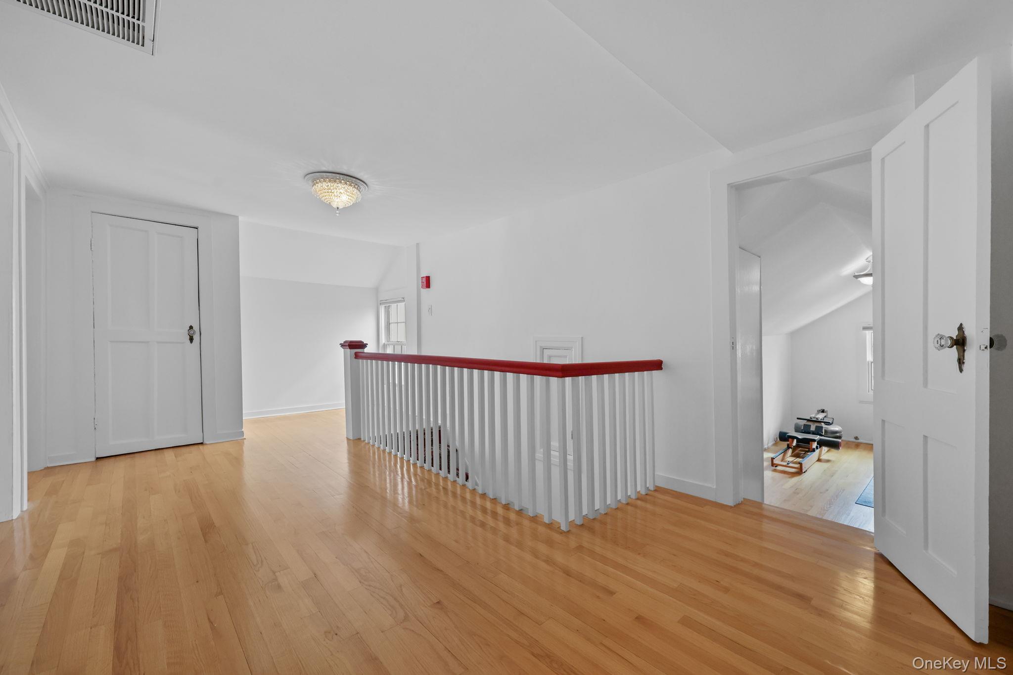 401 Heathcote Road Scarsdale, NY 10583 - Photo 24 of 41 a view of a room with wooden floor