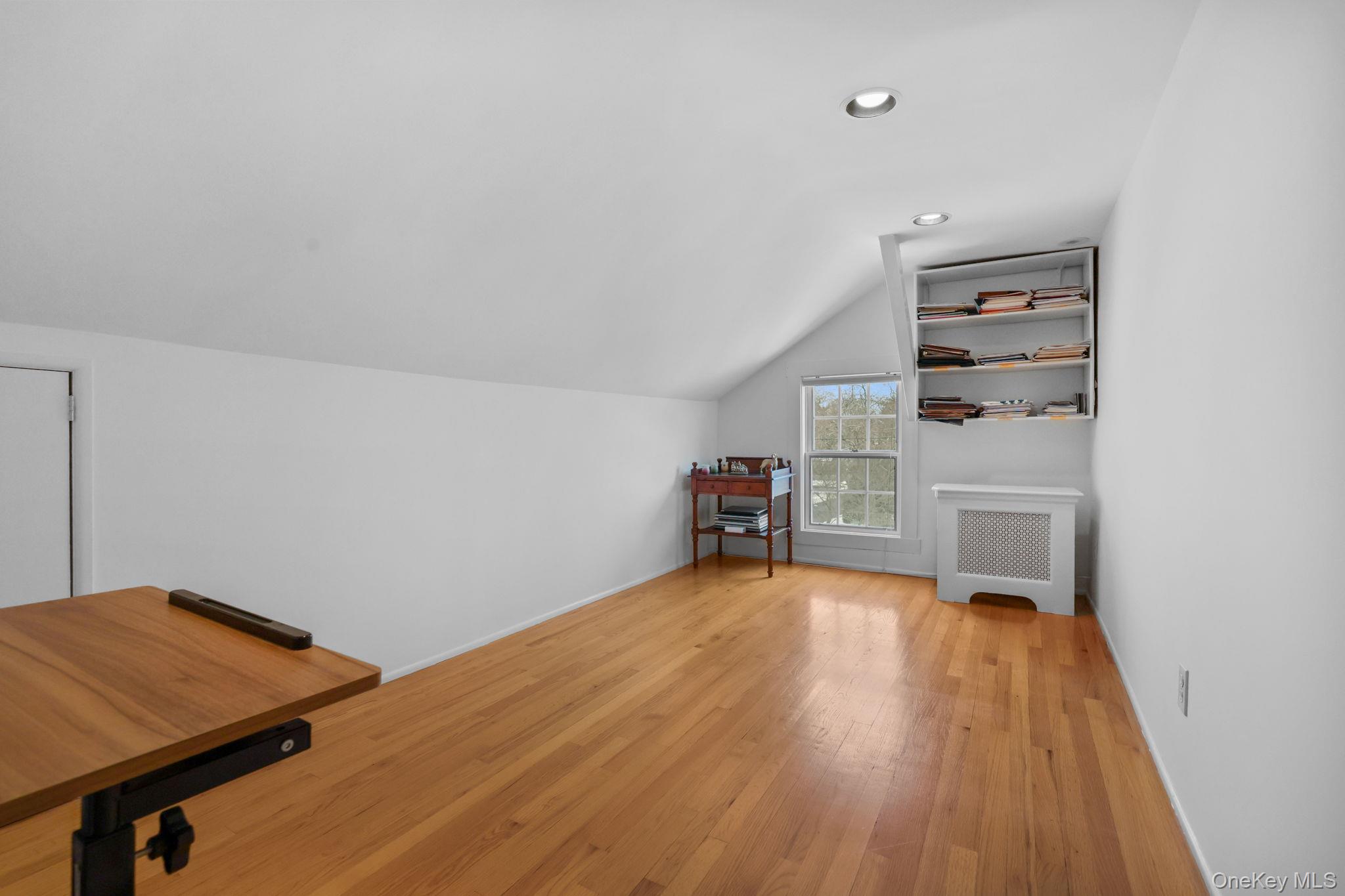 401 Heathcote Road Scarsdale, NY 10583 - Photo 27 of 41 a view of a room with racks on the wall