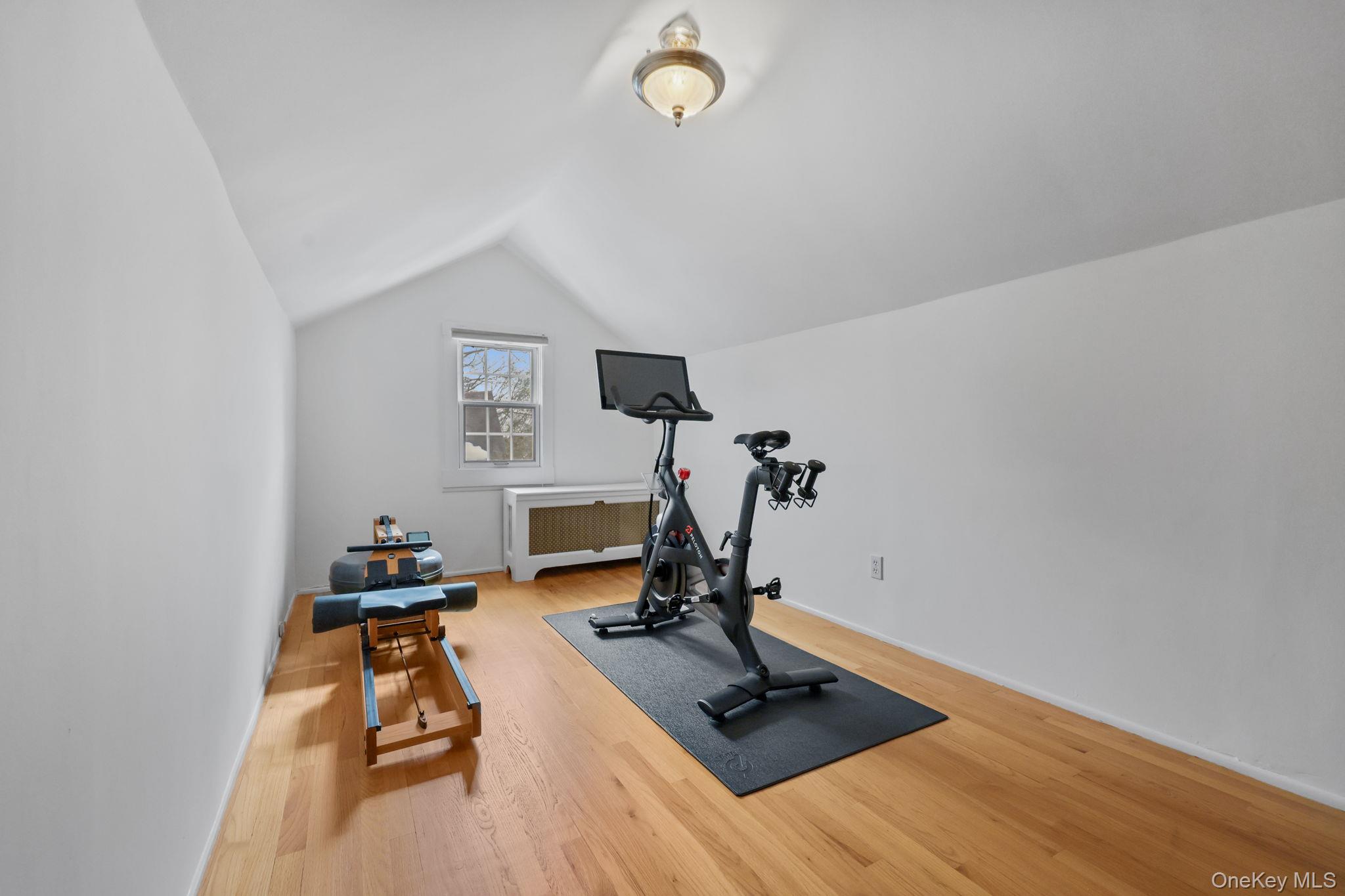 401 Heathcote Road Scarsdale, NY 10583 - Photo 30 of 41 a view of a room with gym equipment