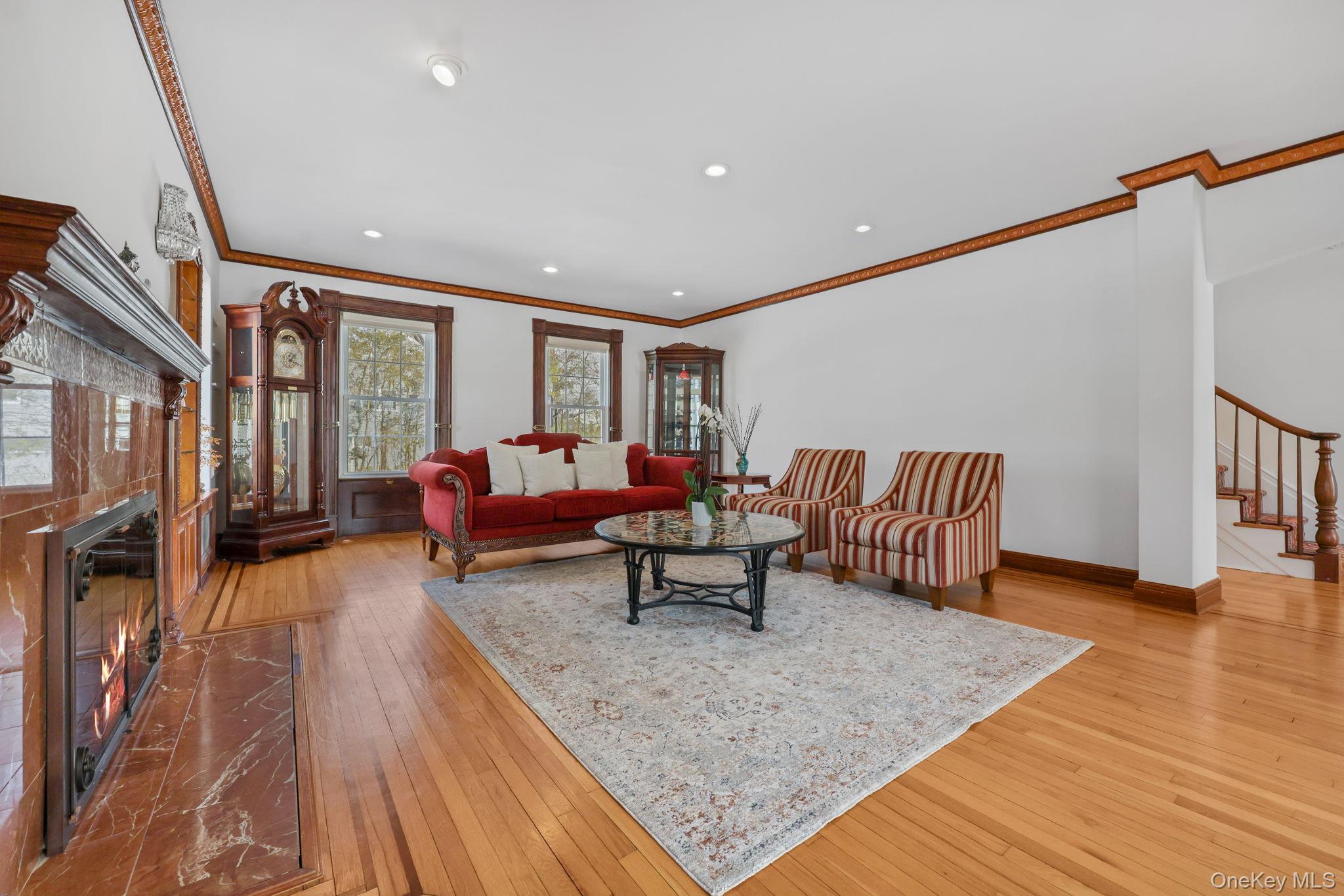401 Heathcote Road Scarsdale, NY 10583 - Photo 7 of 41 a living room with furniture and a couch