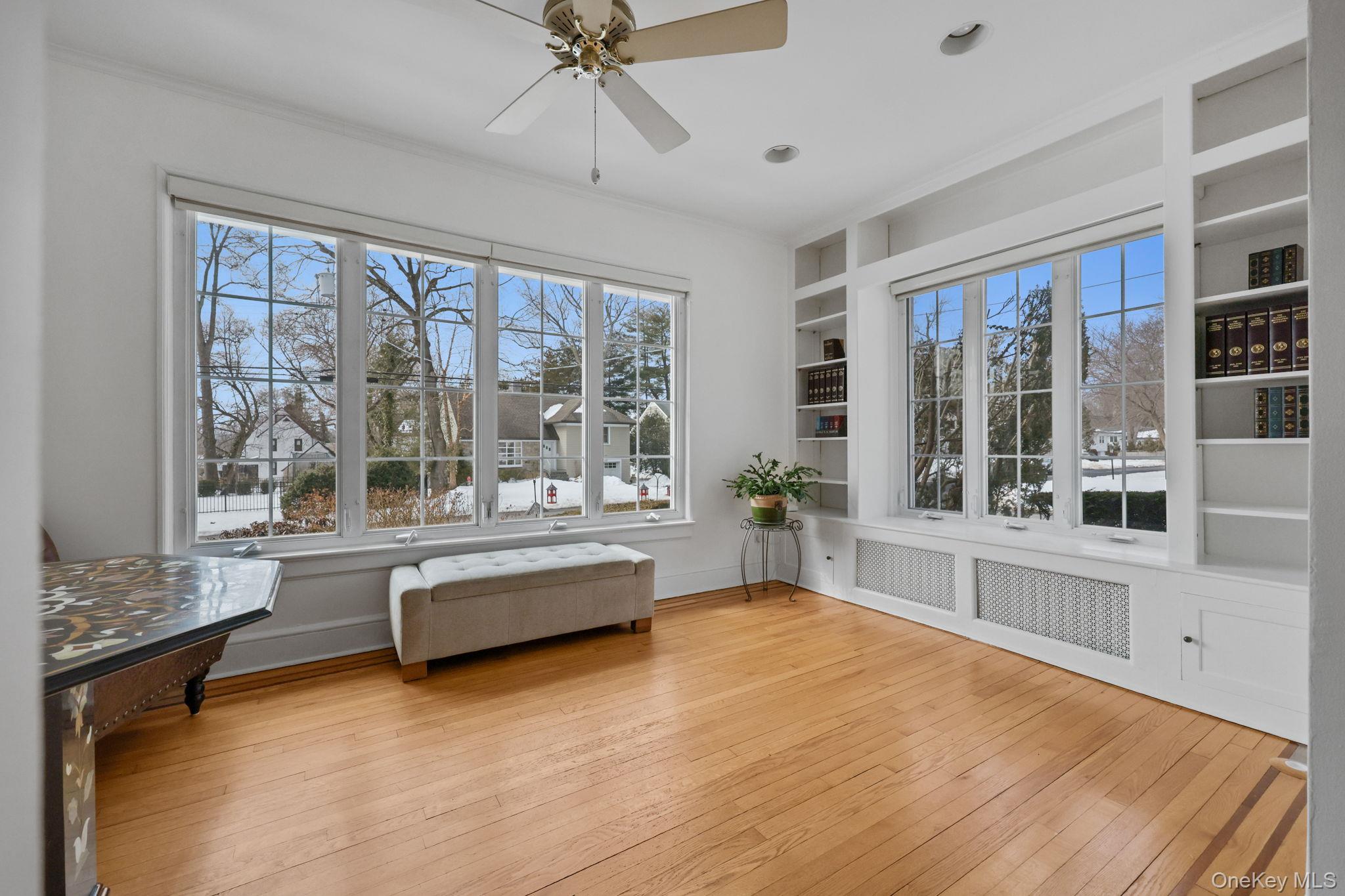 401 Heathcote Road Scarsdale, NY 10583 - Photo 8 of 41 a large white kitchen with granite countertop a large window