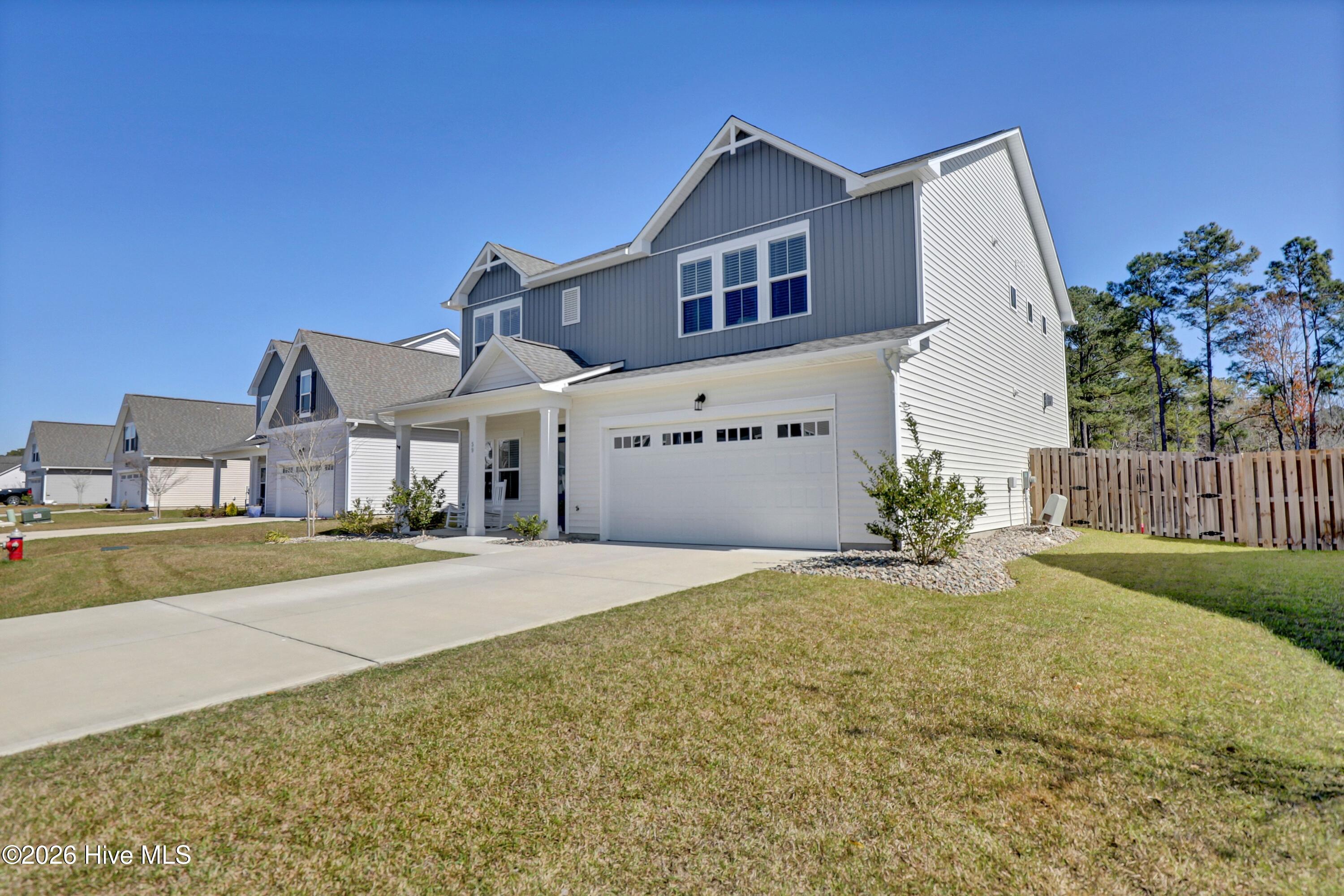 59 East Weatherbee Way Hampstead, NC 28443 - Photo 2 of 76 002_6g8a6661_165