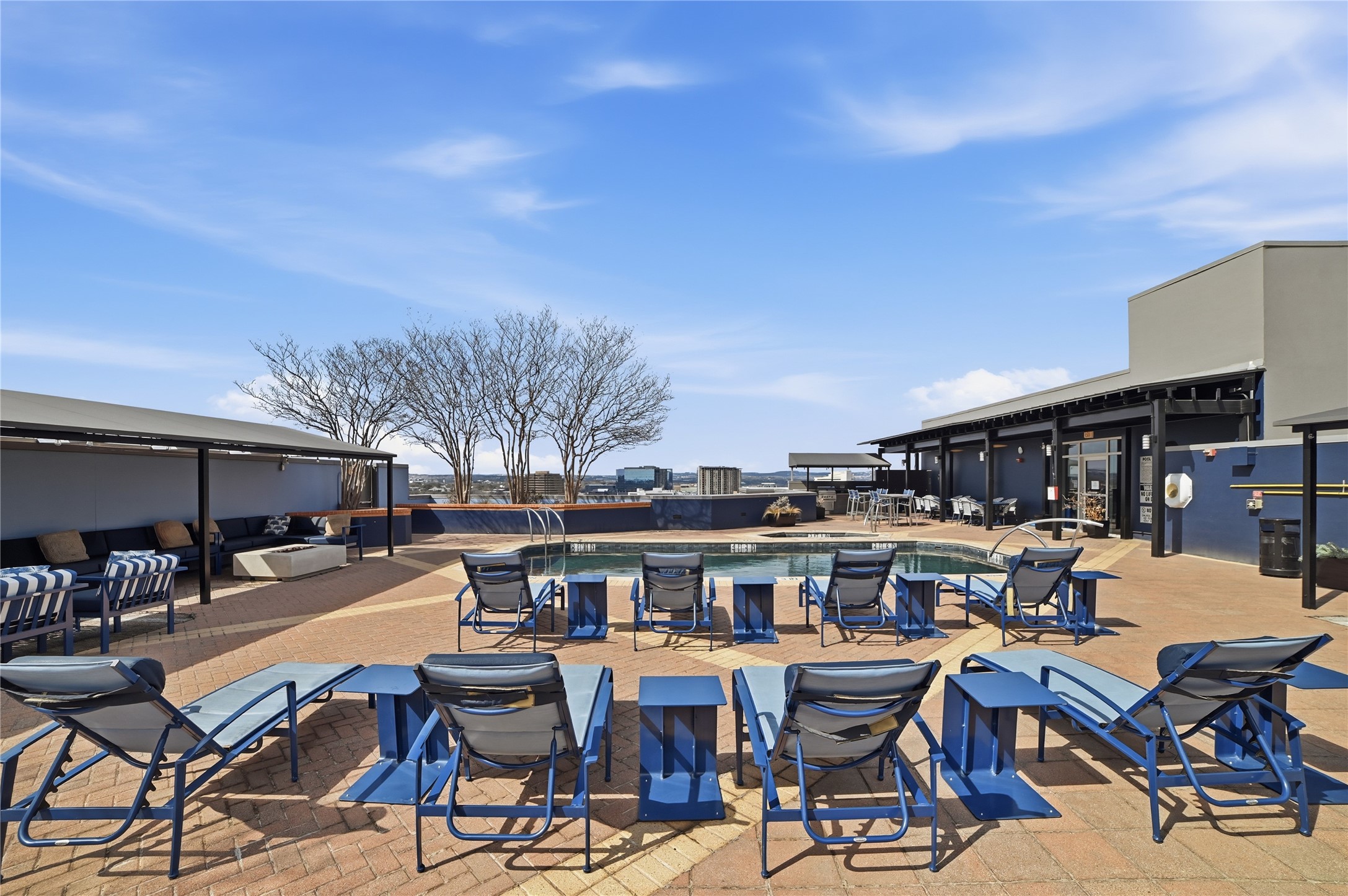 54 Rainey Street, Unit 1018 Austin, TX 78701 - Photo 26 of 32 a view of a chairs and table in the patio