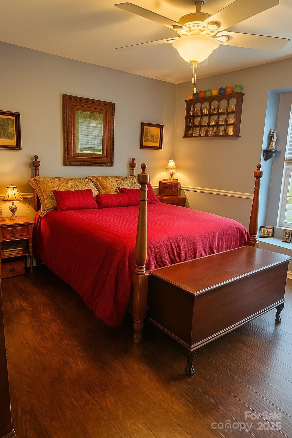 6639 Ruth Ferrell Court Charlotte, NC 28269 - Photo 18 of 27 a bedroom with a bed and lamp