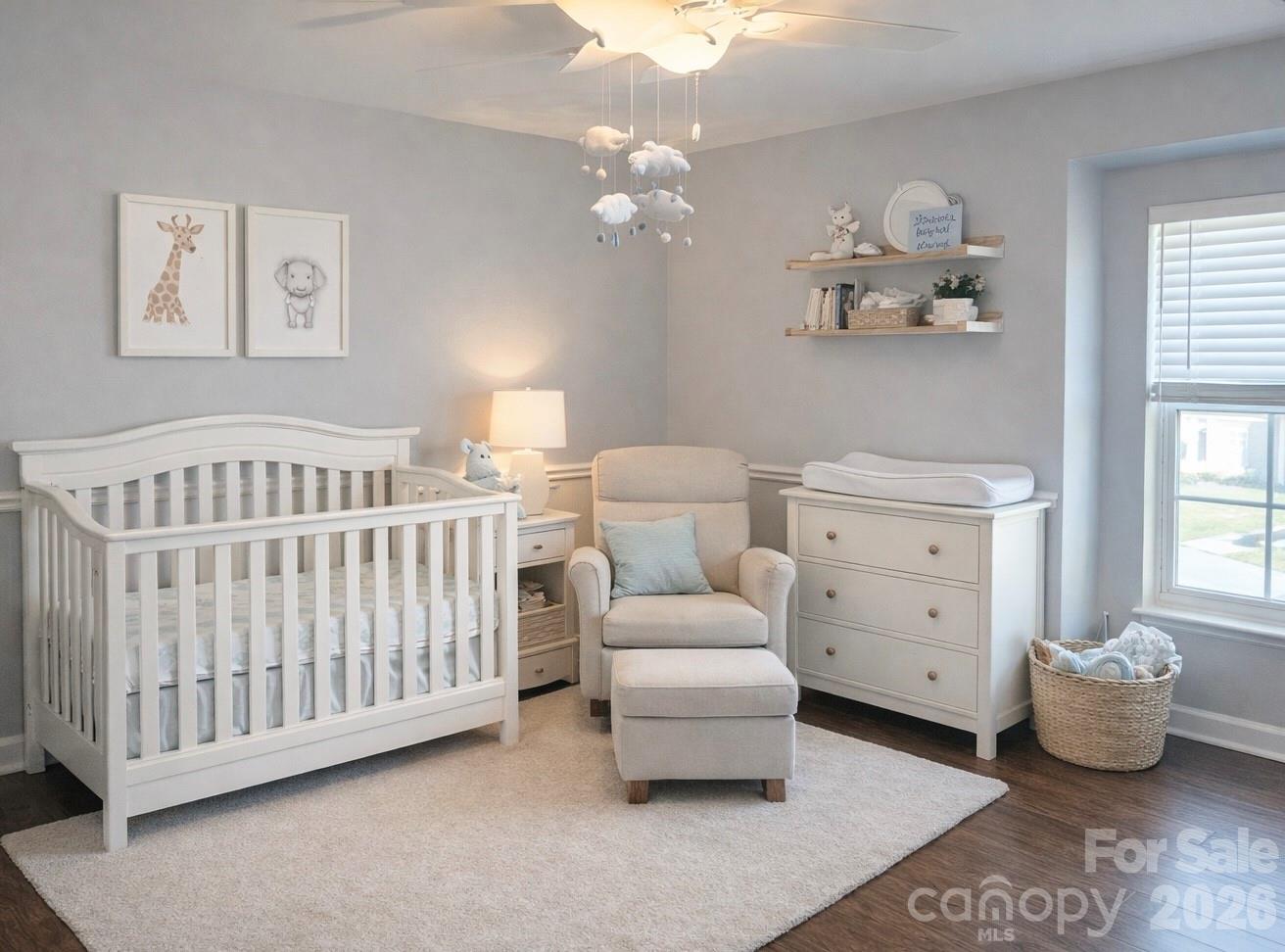 6639 Ruth Ferrell Court Charlotte, NC 28269 - Photo 20 of 30 a bedroom with a bed and window