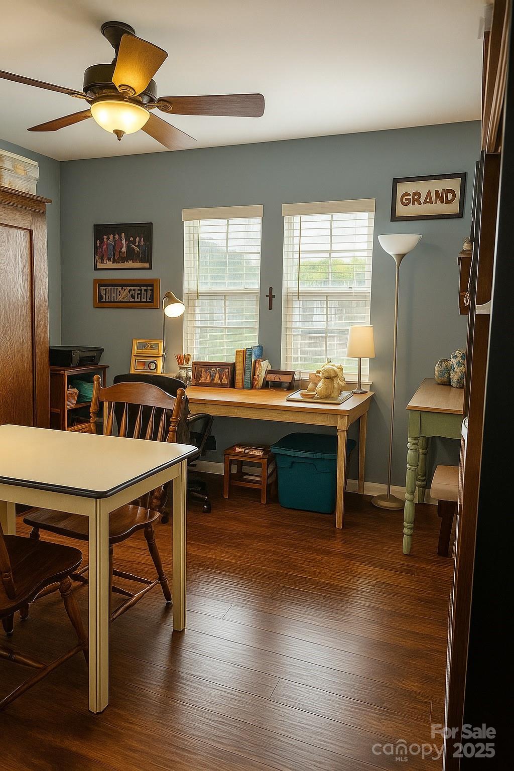 6639 Ruth Ferrell Court Charlotte, NC 28269 - Photo 20 of 27 a room with furniture a large window and wooden floor