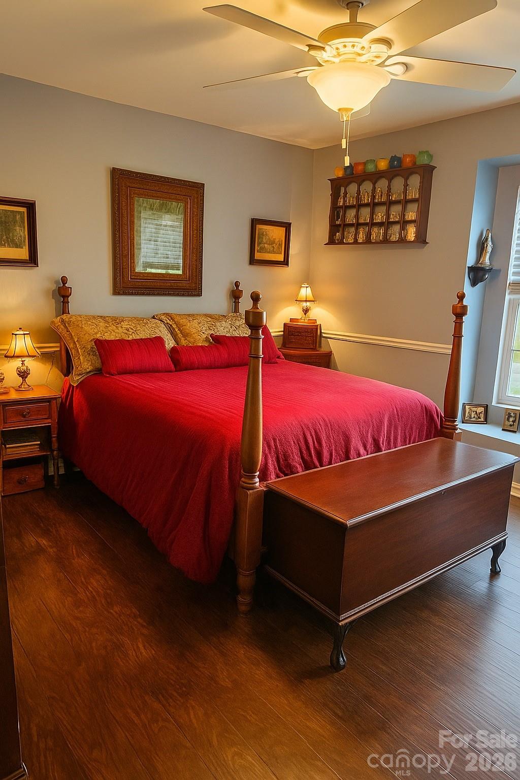 6639 Ruth Ferrell Court Charlotte, NC 28269 - Photo 21 of 30 a bedroom with a bed and lamp