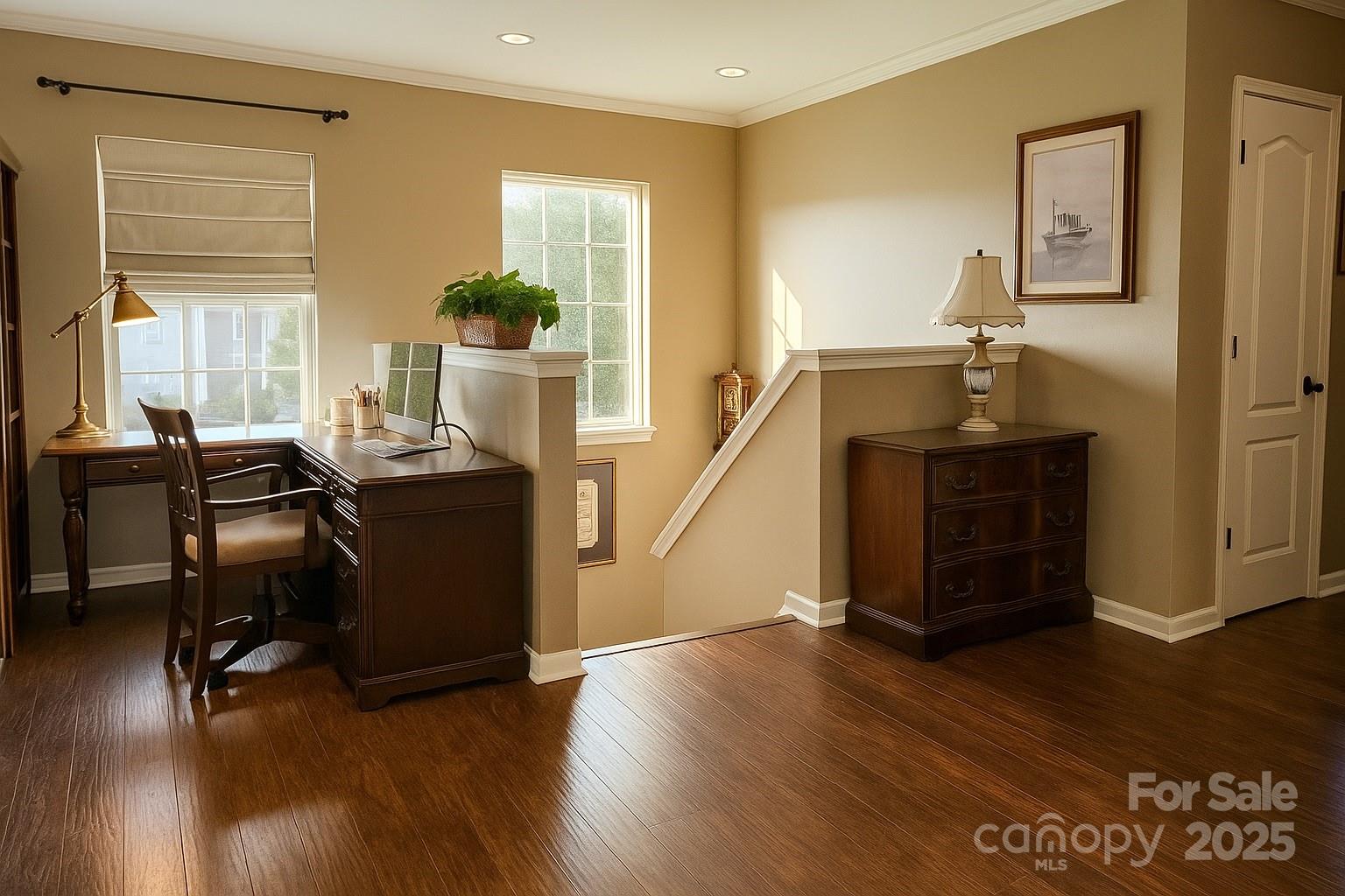 6639 Ruth Ferrell Court Charlotte, NC 28269 - Photo 22 of 27 a view of a workspace with furniture and a window