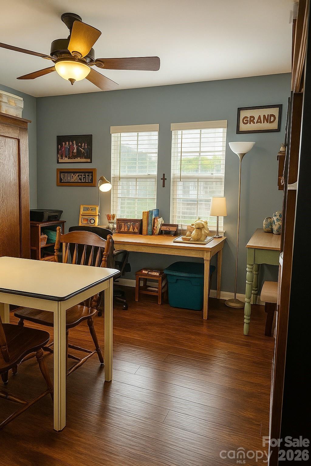6639 Ruth Ferrell Court Charlotte, NC 28269 - Photo 23 of 30 a room with furniture a large window and wooden floor