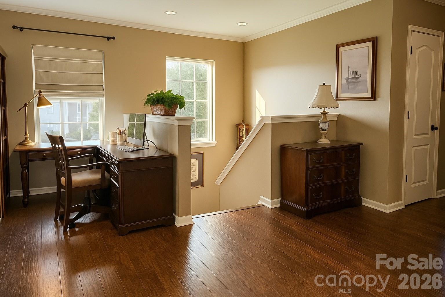 6639 Ruth Ferrell Court Charlotte, NC 28269 - Photo 26 of 30 a view of a workspace with furniture and a window