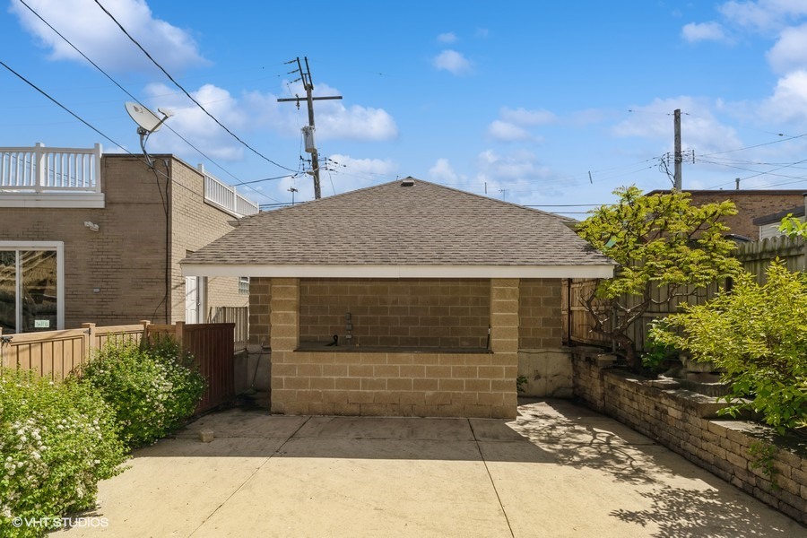 3251 South Normal Avenue Chicago, IL 60616 - Photo 12 of 12 a front view of a house with a yard