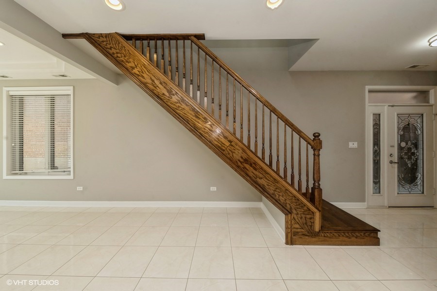 3251 South Normal Avenue Chicago, IL 60616 - Photo 5 of 12 a view of entryway and hall with wooden floor