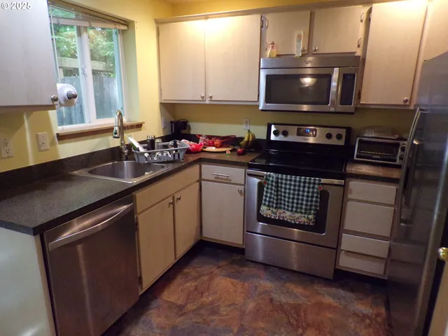 a bedroom with a bed and a mirror