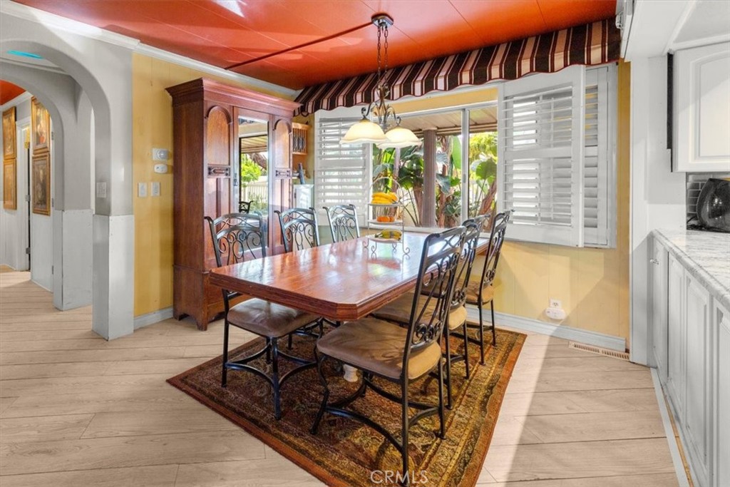 300 North Rampart Street, Unit 158 Orange, CA 92868 - Photo 11 of 31 Dining area open to living space