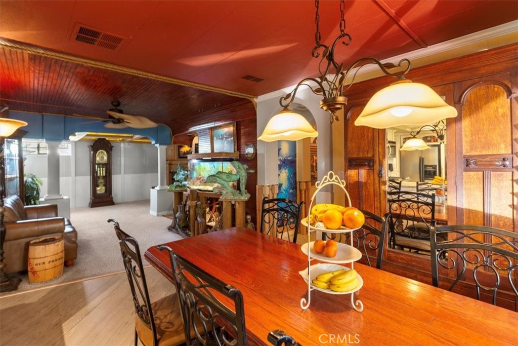 300 North Rampart Street, Unit 158 Orange, CA 92868 - Photo 12 of 31 Dining area open to living space