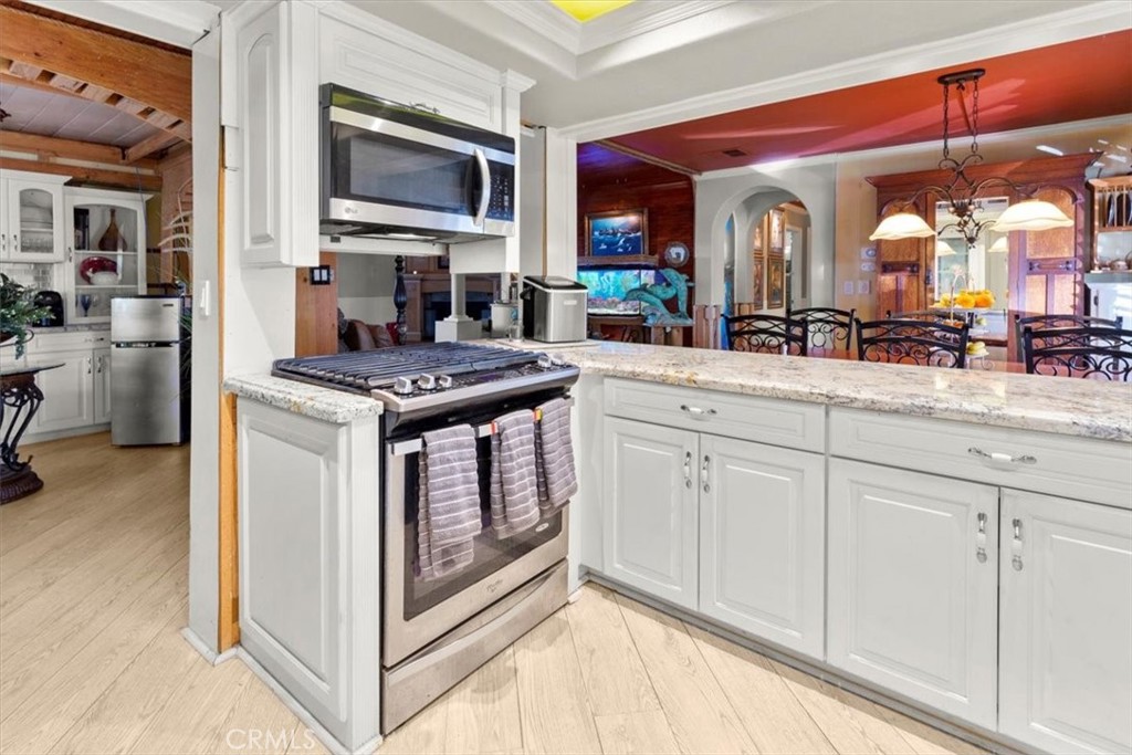 300 North Rampart Street, Unit 158 Orange, CA 92868 - Photo 16 of 31 Updated kitchen with granite counters