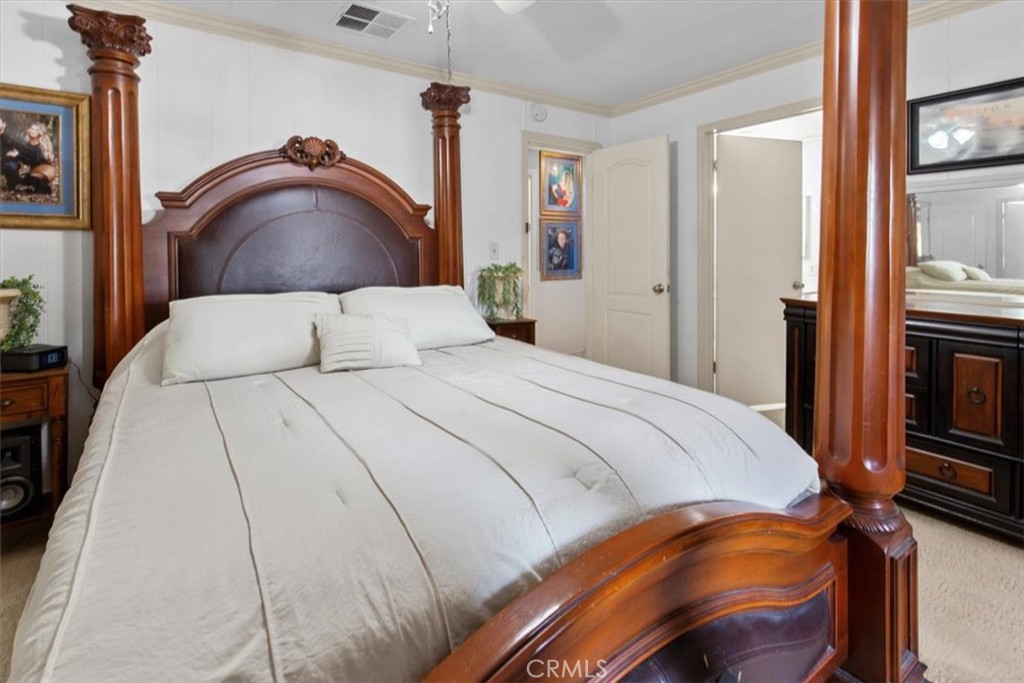 300 North Rampart Street, Unit 158 Orange, CA 92868 - Photo 20 of 31 Spacious primary bedroom suite