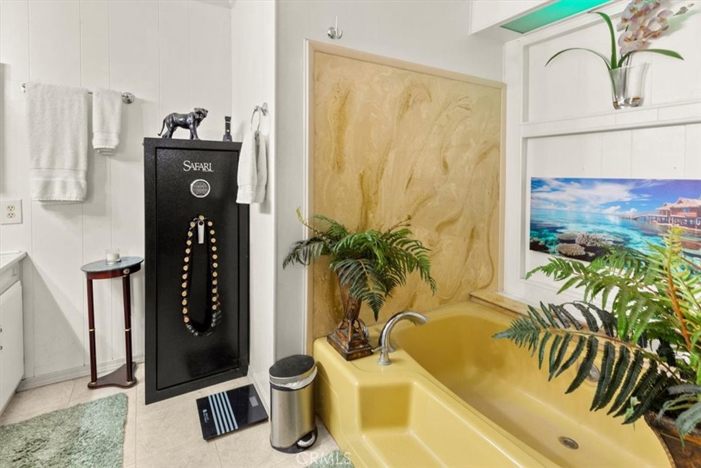 300 North Rampart Street, Unit 158 Orange, CA 92868 - Photo 24 of 31 Primary bath with soaking tub