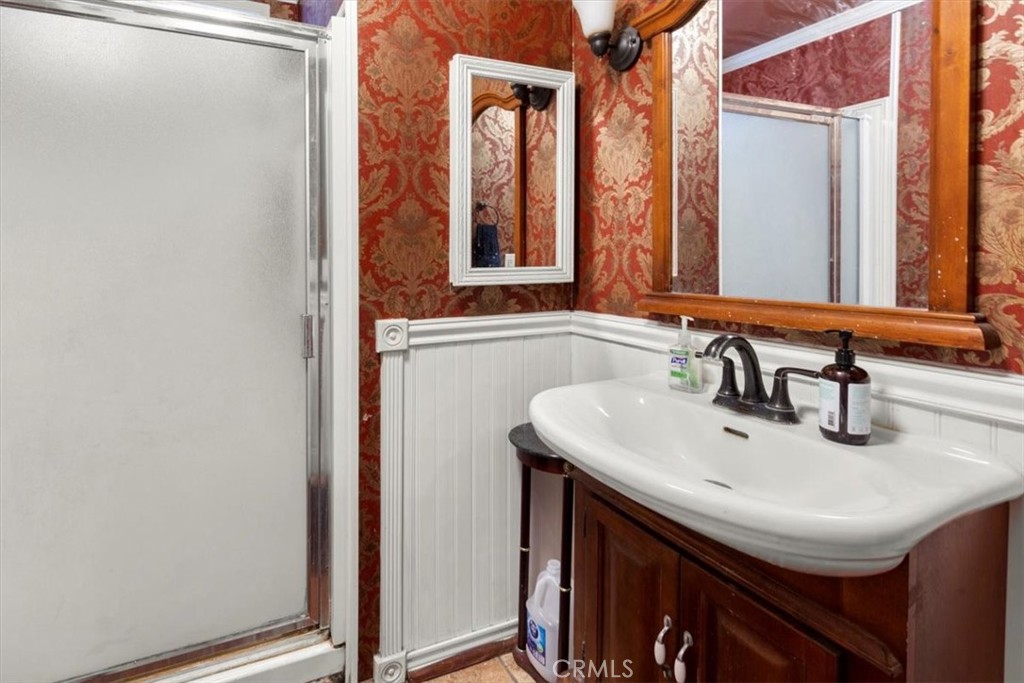 300 North Rampart Street, Unit 158 Orange, CA 92868 - Photo 25 of 31 Guest bath with walk in shower