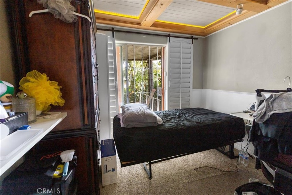 300 North Rampart Street, Unit 158 Orange, CA 92868 - Photo 26 of 31 Bedroom with patio access