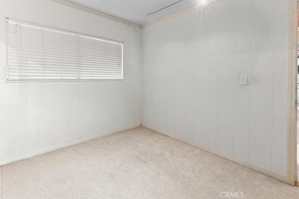 300 North Rampart Street, Unit 158 Orange, CA 92868 - Photo 30 of 31 Additional bedroom with mirrored closet