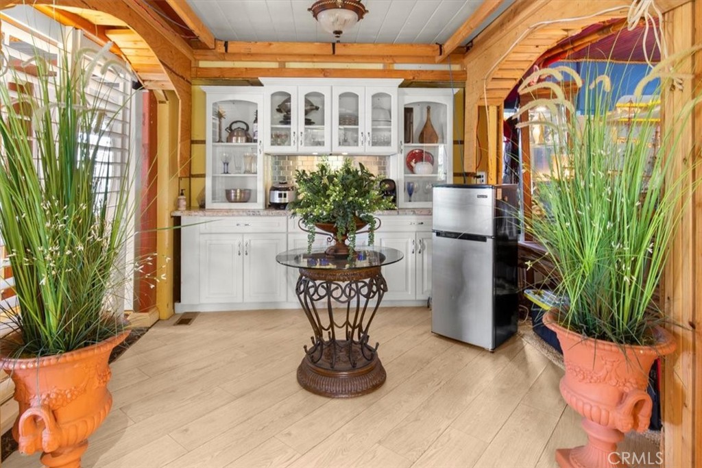 300 North Rampart Street, Unit 158 Orange, CA 92868 - Photo 7 of 31 Light filled bonus room off kitchen