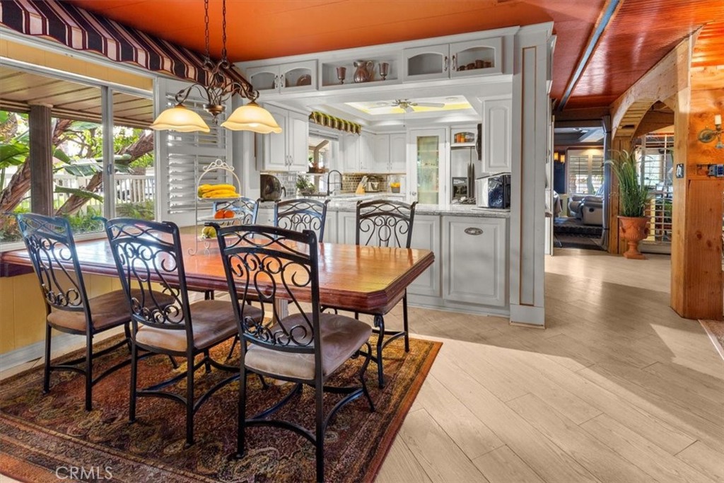 300 North Rampart Street, Unit 158 Orange, CA 92868 - Photo 8 of 31 Open kitchen with adjacent dining area