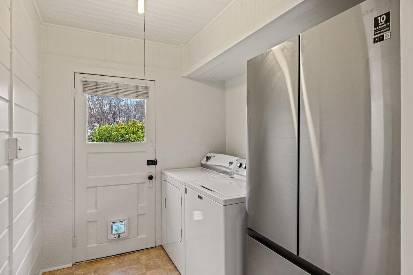 21 Fourth Street Spreckels, CA 93962 - Photo 13 of 31 a utility room with cabinets washer and dryer
