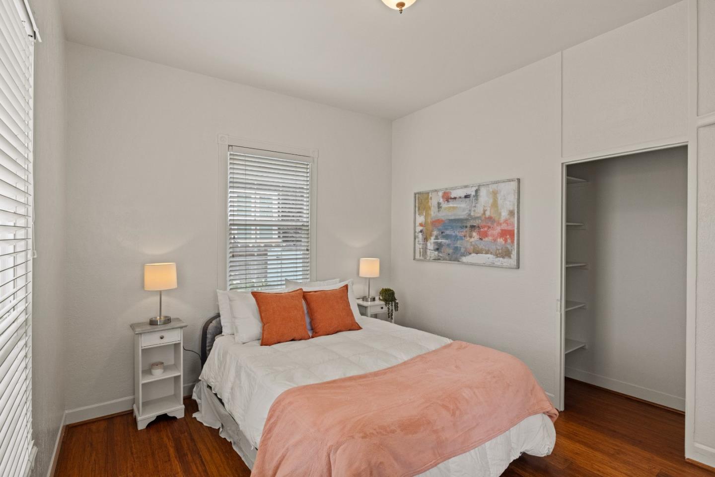 21 Fourth Street Spreckels, CA 93962 - Photo 19 of 31 a bedroom with a bed and wooden floor