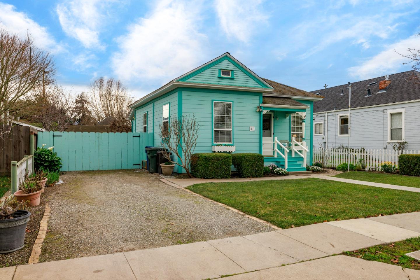 21 Fourth Street Spreckels, CA 93962 - Photo 28 of 31 a front view of a house with a yard and potted plants