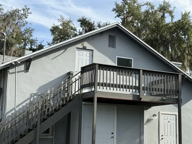 a view of balcony with a deck