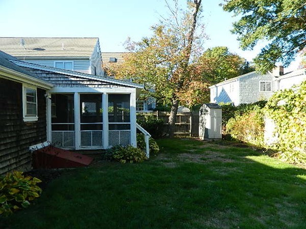 28 Hatherly Road Scituate, MA 02066 - Photo 8 of 21 a view of an house with backyard space and garden