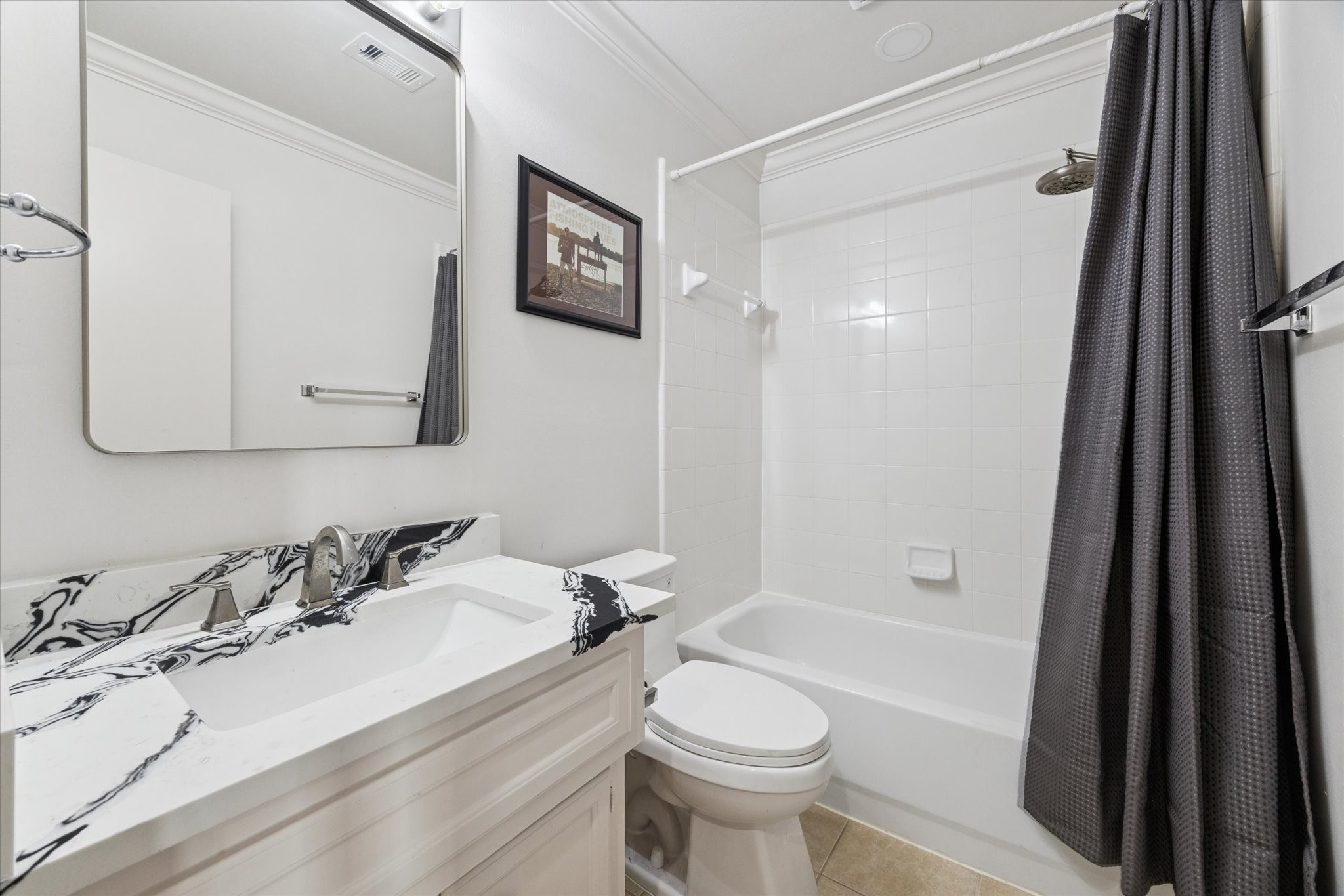 1259 West 17th Street Houston, TX 77008 - Photo 15 of 22 a bathroom with a granite countertop sink mirror vanity and toilet