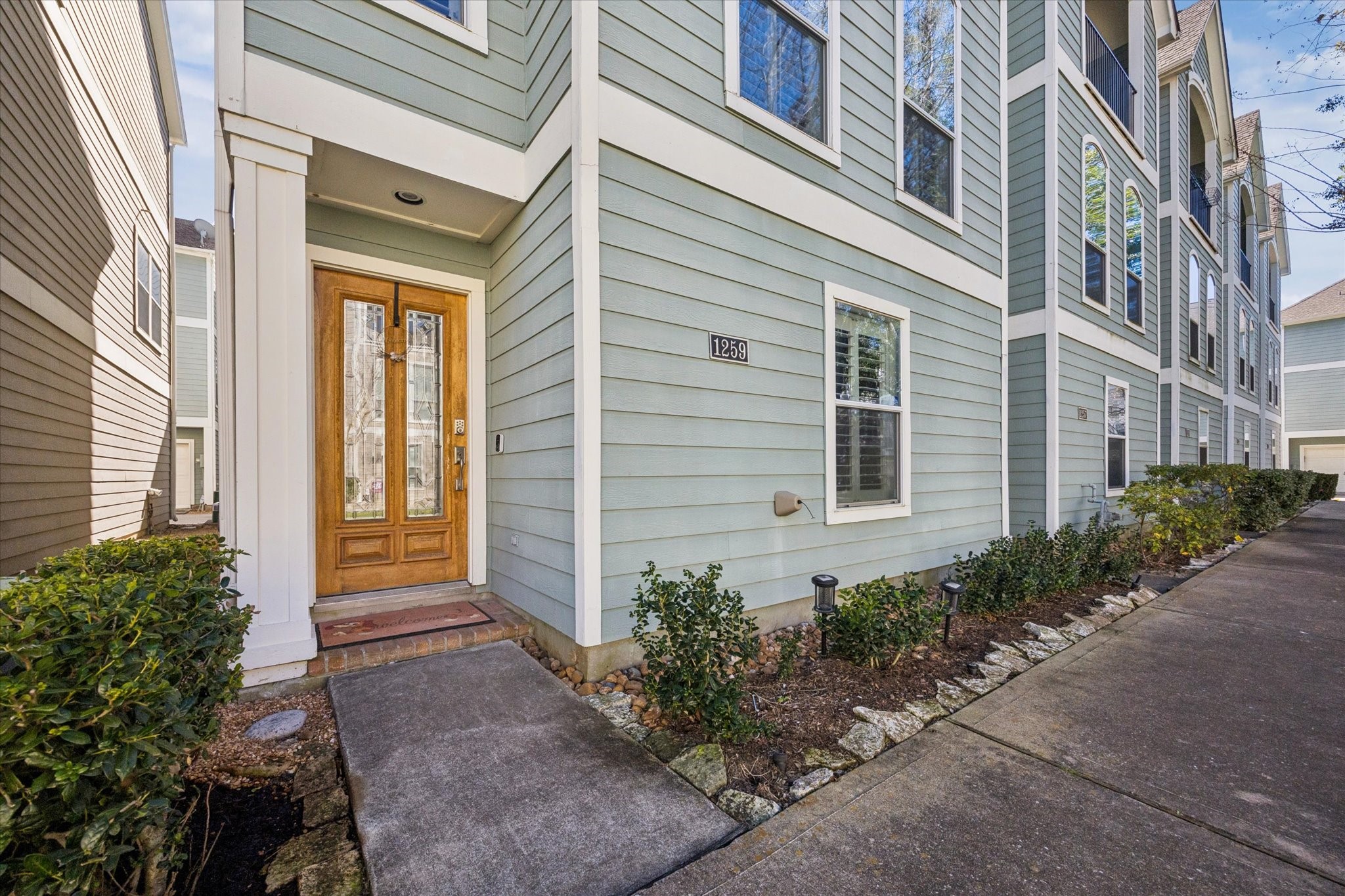1259 West 17th Street Houston, TX 77008 - Photo 3 of 22 a view of a potted plants in front of a building