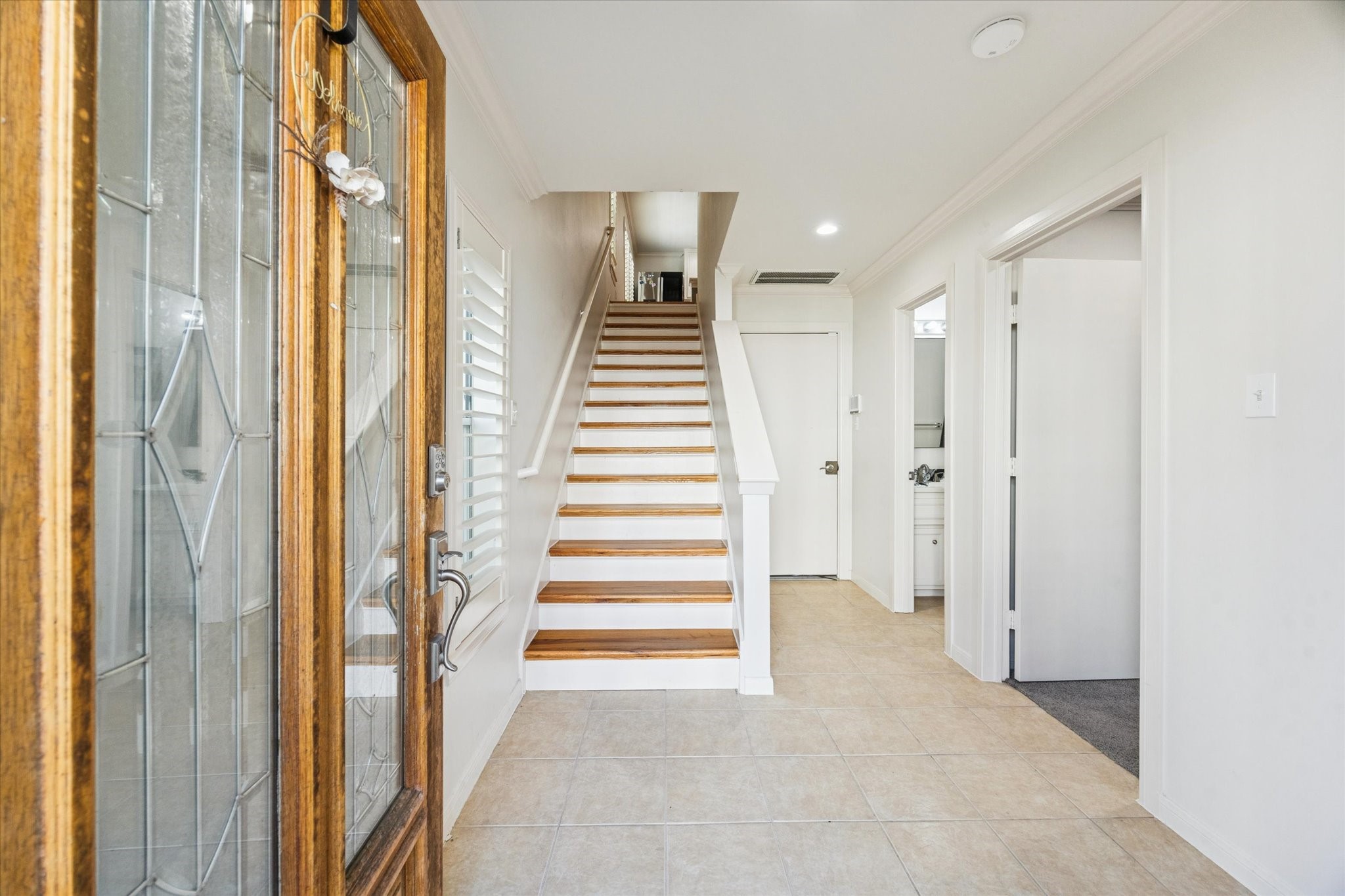 1259 West 17th Street Houston, TX 77008 - Photo 4 of 22 a view of a hallway with entryway and stairs