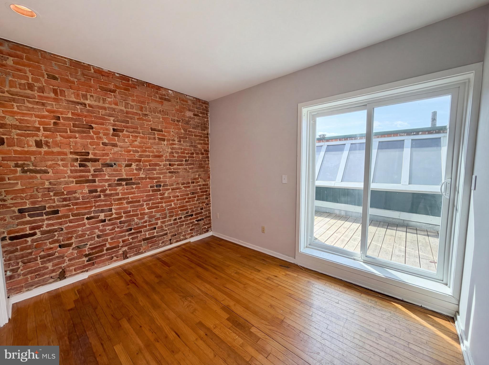 724 13th Street Northeast Washington, DC 20002 - Photo 4 of 20 Charming space with exposed brick wall.