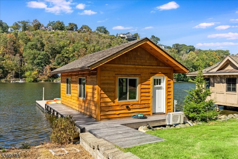 20 Island Trail Sparta, NJ 07871 - Photo 17 of 23 a front view of a house with a yard