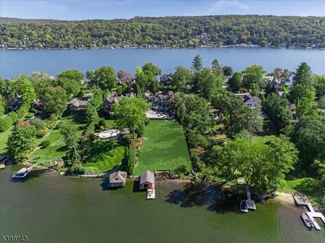 a view of a lake with a building in the background