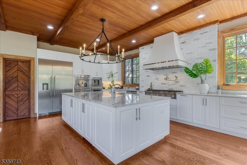 20 Island Trail Sparta, NJ 07871 - Photo 5 of 23 a kitchen with stainless steel appliances granite countertop a sink and cabinets