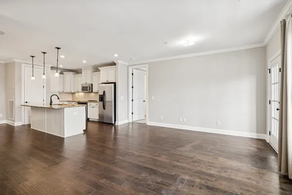a view of kitchen with wooden floor