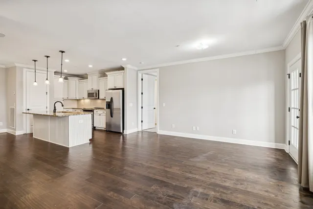 a view of kitchen with wooden floor
