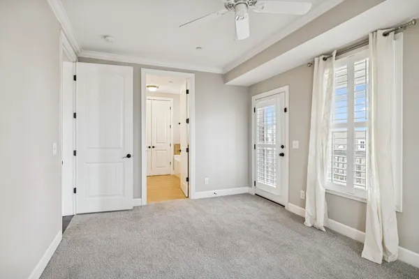 a view of a bathroom with a shower and a sink