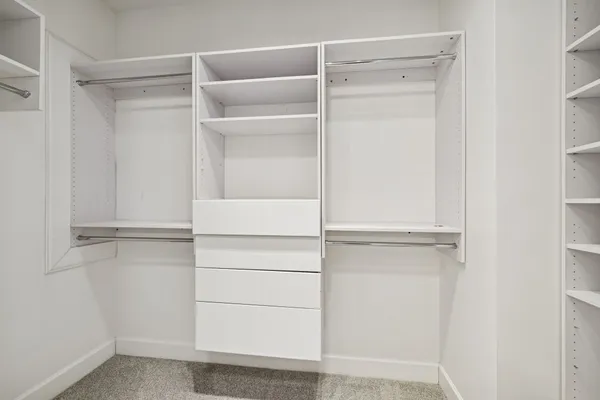 a view of an empty walk in closet